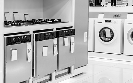 photo of a row of appliances in a retail store